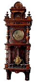 Часы настенные в деревянном резном футляре, маятниковые, с заводным механизмом. Конец XIX - начало ХХ вв.