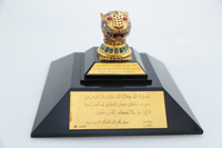 Украшение трона султана Типу, правителя Майсура, в виде головы тигра. Лондон, Asprey & Cole, 4 мая 1799 года. Золото, драгоценные камни, медь, пластик. © Национальный музей, Султанат Оман