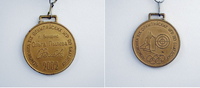 Медаль памятная чемпионки ХIХ Олимпийских игр в Солт-Лейк-Сити по биатлону Ольги Пылёвой (Медведцевой). 2002 г.